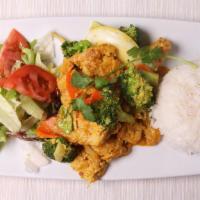 Coco Curry (Soy) · Coconut curry with soy chicken, bell pepper, onion, carrot & broccoli served with rice or ve...