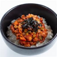Chicken Bulgogi Bibimbap · Spicy or mild. Topped with sesame seeds, seaweed, nuts and served on a bed of rice.