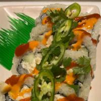 Spicy Scallop Roll · Scallop with cucumber, spicy sauce, sriracha, green onion and chili powder.