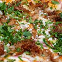 Carnitas Pizza · Tomatillo, Onions, Jalapenos, Cotija, Cilantro