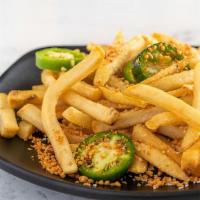 1161. Garlic Jalapeno Fries · Golden fries and toasted garlic are tossed in the wok with fresh jalapenos.