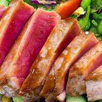 Asian Salad · seared ahi tuna, mixed greens, cucumber, edamame, red cabbage, carrot, green onion, peanuts,...
