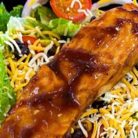 Bbq Salad · grilled 8 oz salmon, romaine, tomato, corn, red onion, black beans, four cheese blend, BBQ s...