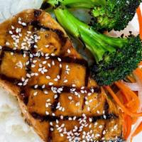 Salmon Teriyaki Bowl · grilled 8 oz salmon, broccoli, teriyaki glaze, pickled slaw mix, steamed white rice