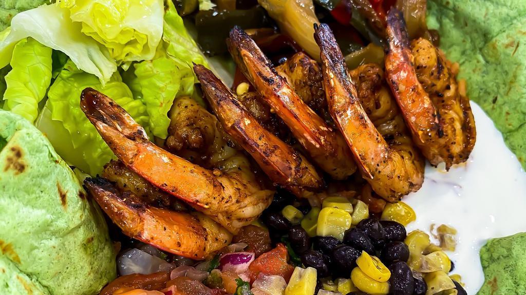 Mexican Bowl · grilled shrimp, black beans, corn, romaine, sour cream, tomato salsa, smoky tomato rice