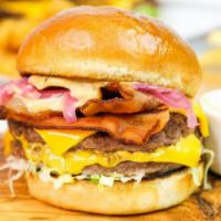 Truffle Burger · Two 3oz. Smash patties with bacon, truffle mayo, American cheese, lettuce and caramelized on...