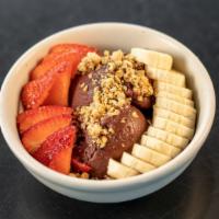 Brazilian · Açai base with toppings: granola, banana, strawberry.