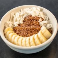 The Paleo · Açai base with toppings: flaxseed, banana, coconut, almond butter.