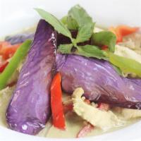 Green Curry · Basil and bell pepper give a vibrant hue. Served also with eggplant.