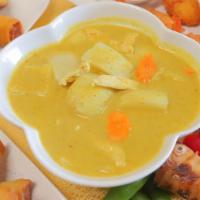 Yallow Curry · Coconut milk with yellow curry,potato,carrot &  onion.