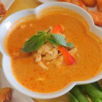 Red Curry · Spicy. Coconut milk with red curry, bamboo shoots, bell pepper & basil.