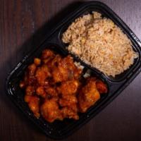 Orange Chicken 陈皮鸡 · Spicy. Combo plate. Comes with pork or white rice and an pork egg roll.
