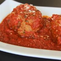 Homemade Meatballs · Served over homemade marinara and topped with melted mozzarella.