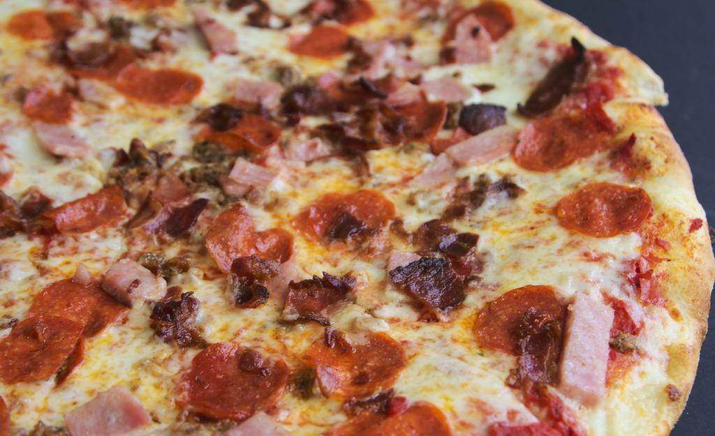 Meat Lovers  Pizza - Medium · Tomato sauce, sausage, pepperoni, bacon, ham, and  mozzarella
