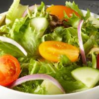 Mixed Green Salad · Mixed greens tossed with red onion, tomato, and cucumbers. Served with Italian dressing.