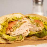 Turkey & Avocado Sandwich · turkey, avocado, alfalfa sprouts, tomato, red onion, romaine, whole grain mustard, and mayo.
