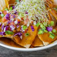 Loaded Nachos · Organic corn tortilla chips, housemade nacho 'cheese', pico de gallo, lentil asada and mixed...