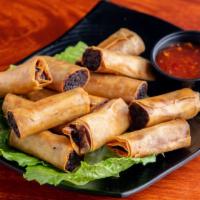 Lumpiang Shanghai (Egg Roll) · Deep-fried egg rolls consists of ground pork and veggies.
