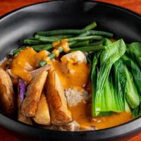 Kare-Kare (Beef Peanut Stew)) · Beef stew prepared with beef shank, oxtail, and vegetables simmered in thick peanut sauce.