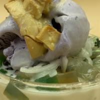 Halo-Halo · A blend of refreshing tropical fruit preserves, beans, jackfruit, macapuno (sweet coconut st...