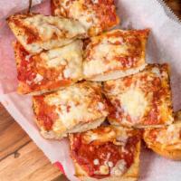 Pepperoni Pizza Bread · Sourdough bread brushed with olive oil, garlic and marinara sauce then topped with pepperoni...
