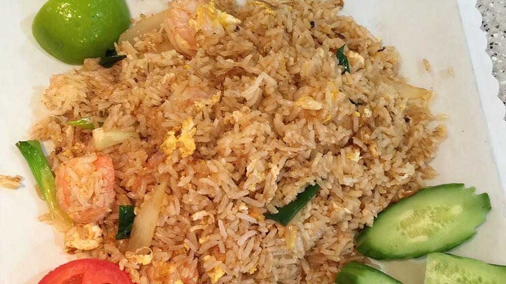 Spicy Fried Rice · Spicy fried rice with choice of proteins, basil, bell pepper, and onion.