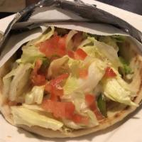 Chicken Gyro · Hot delicious pile of fresh off the spit gyro with lettuce, onions, tomatoes and tzatziki sa...