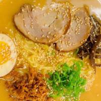 Tonkotsu Miso · Rich pork broth compliments miso tare topped with pork chashu, green onion, sesame seed, kik...