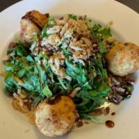 Goat Cheese And Cranberry Fritters · Served with organic butternut sqauch chips, thinly sliced baked beets, wild arugula, orange ...