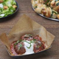 Roasted Meatballs Small · Heartly meatballs topped with flippin pizza sauce and fresh ricotta. Then oven roasted with ...