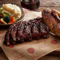 Rotisserie Chicken & Ribs Family Meal (Large) · Large: Two whole rotisserie chickens, two racks of baby back ribs and three large sides. Ser...
