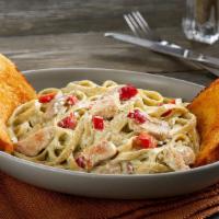 Chicken Pesto Fettuccine · Chicken breast with mushrooms and red bell
peppers in a pesto cream sauce over fettuccine
no...