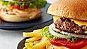 Cheese Burger With Fries · Beef pattie, Thousand dressing, lettuce, pickles and tomato, cheese with fries. Add a can so...