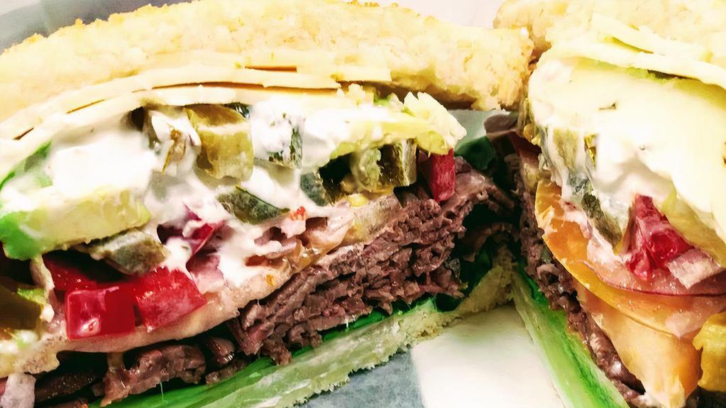 Peppered Roast Beef · Roast Beef, Pepper Jack, Bell Pepper, Avocado, Jalapeños, Lettuce, Tomatoes, Onion and Mayonnaise with Gyro Sauce