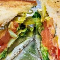 Veggie Melt · Broccoli, Cheddar, Onion, Tomatoes, Avocado, Pickle, peperoncinis and Mayonnaise with Salt a...