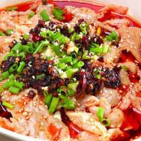 水煮肥牛 / Thin Slice Beef In Spicy Chili Soup · Thin cut beef slices in chili broth (comes with rice).