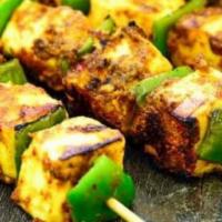 Paneer Tikka · Marinated paneer seasoned with spices and cooked Dry.