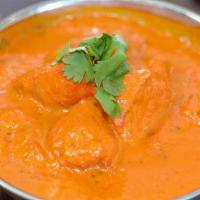 Lamb Tikka Masala · Boneless lamb pieces cooked in spices in creamy sauce.