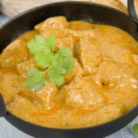 Chicken Coconut Curry · Coconut flavored chicken cooked with dairy free coconut milk and herbs.