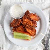 Buffalo Wings · Homemade wings in a spicy sauce served with ranch dressing and bleu cheese.