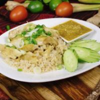 Hainan Chicken Rice · Chicken thigh, ginger rice, cucumber served with chicken broth and ginger spicy sauce or swe...