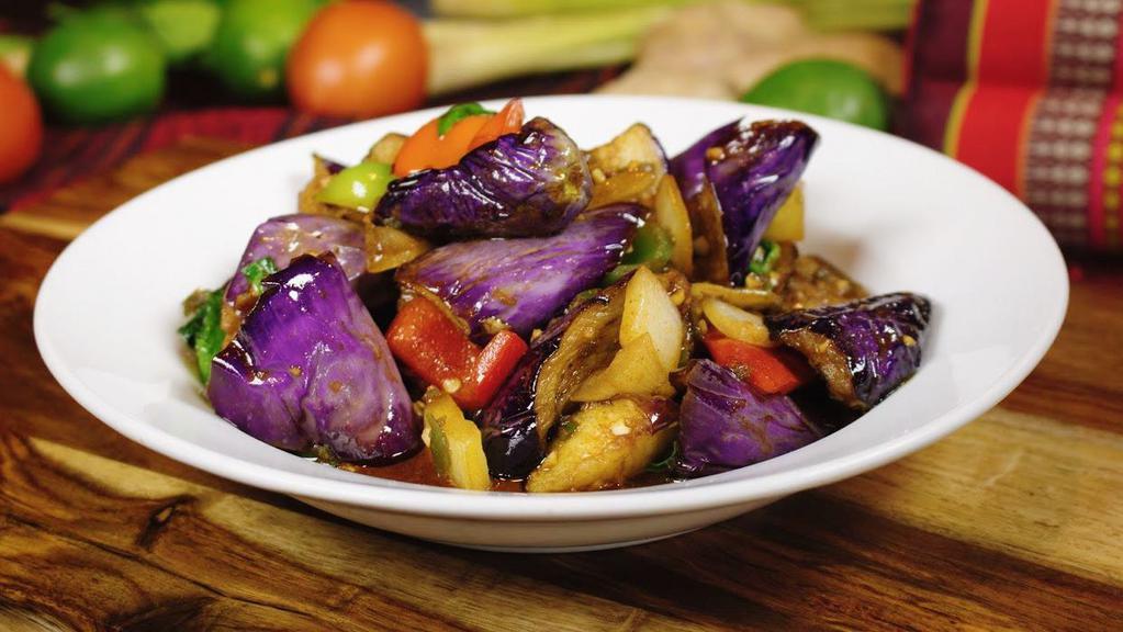 Spicy Eggplant · Sauteed Chinese eggplant with bell peppers, flavored with black bean sauce and sweet basil leaves.