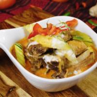 Panang Beef Short Ribs · Slow cooked beef short ribs in panang curry and coconut cream.