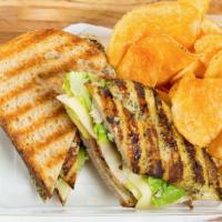 Grilled Chicken Sandwich · Grilled chicken breast, provolone, smoked bacon, avocado, lettuce, inside grilled  Larder so...