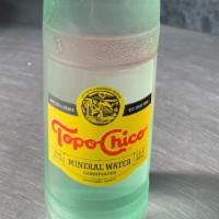 Topo Chico Sparkling · Sparkling Mineral Water.  355 ml