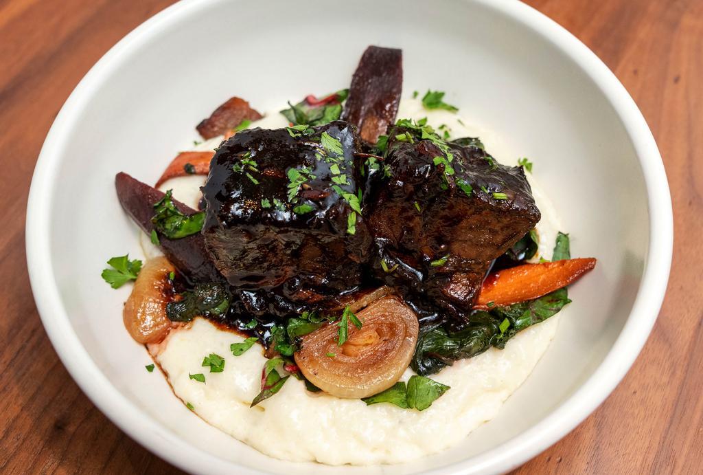 Braised Short Rib · Roasted fennel, heirloom carrot, grilled asparagus, mascarpone polenta, short rib jus.