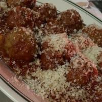 Polpette Alla Arrabbiata · Homemade meat balls with spicy marinara sauce.