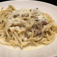 Spaghetti Carbonara · All Rights Reserved. 

Spaghetti, pancetta, egg, black pepper and alfredo sauce.