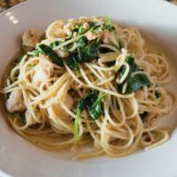 Spaghetti Alla Cristiano · Spaghetti with sautéed chicken, baby spinach, garlic, chili flakes and extra virgin olive oil.