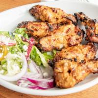 Tandoori Chicken Wings · wings marinated in yogurt and cooked to perfection in tandoor